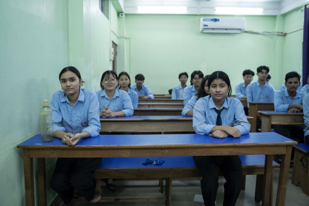 students attending lecture in modern classroom of top coaching center in Guwahati